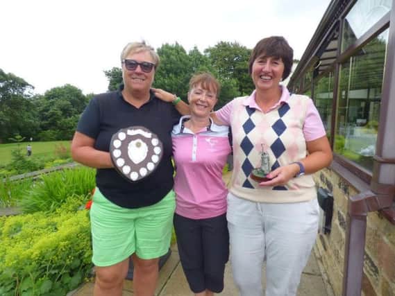 Ellisford Trophy winner Diane Higgins, right, with Carole Hampson, left, winner of the ladies' gross shield, and Crow Nest Park lady captain Gwyn Greenberry.