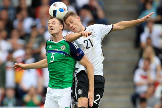 Germany's Joshua Kimmich, right. Picture: Mike Egerton/PA.