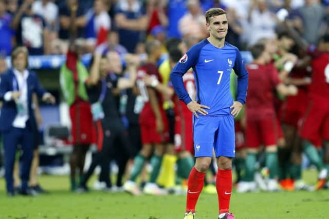 France's Antoine Griezmann shows his dismay after Portugal's victory in the final of Euro 2016 in Paris. Picture: AP/Michael Probst