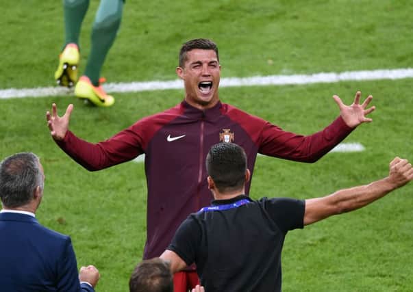 Portugal's Cristiano Ronaldo celebrates winning the UEFA Euro 2016 Final at the Stade de France, Paris