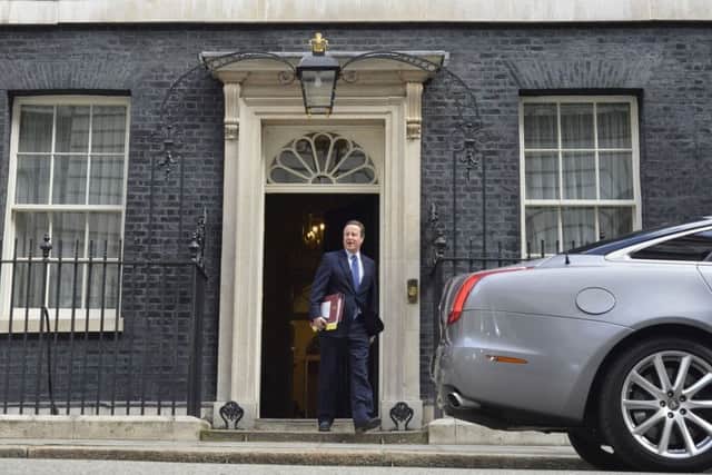 David Cameron leaves 10 Downing Street.