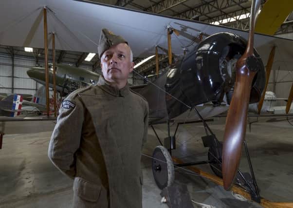 Gary Hancock, museum technician, infront of the refurbished  bi-plane, which was transported to the International Somme Commemoration event at Thiepval, in Northern France.

Picture James Hardisty