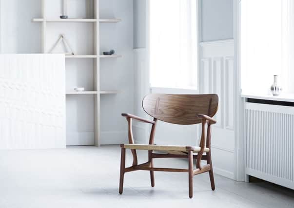 Hans Wegner's perfect  Lounge chair now re-made for a new generation. Prices start at about Â£1,800