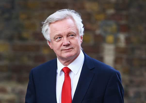 David Davis arrives at 10 Downing Street, central London, after Theresa May accepted Queen Elizabeth II's invitation to become Prime Minister and form a new government. Gareth Fuller/PA Wire