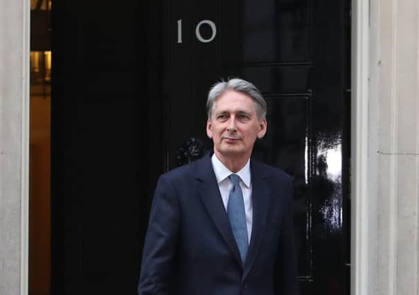 File photo dated 13/07/16 of Philip Hammond, who has risen to some of the highest offices in Government while leaving little trace in the public imagination. PRESS ASSOCIATION Photo. Issue date: Thursday July 14, 2016. His reputation - within Westminster at least - has been as a highly articulate and effective "safe pair of hands" who can plough a steady course without causing drama, upset or excitement. See PA story POLITICS Conservatives Hammond. Photo credit should read: Steve Parsons/PA Wire