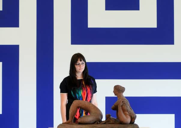 Rachel Graves is pictured with 'Reclining Figure' 1946 by F.E. McWilliam, in front of Renovation Renovation Filter Lobby Diagram by Liam Gillick. Pictures by Scott Merrylees