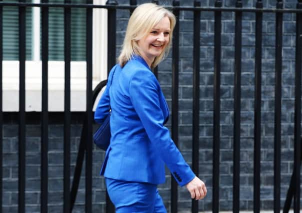 Newly appointed Justice Secretary Liz Truss leaves Downing Street, London, as Prime Minister Theresa May puts the finishing touches to her top team. Dominic Lipinski/PA Wire