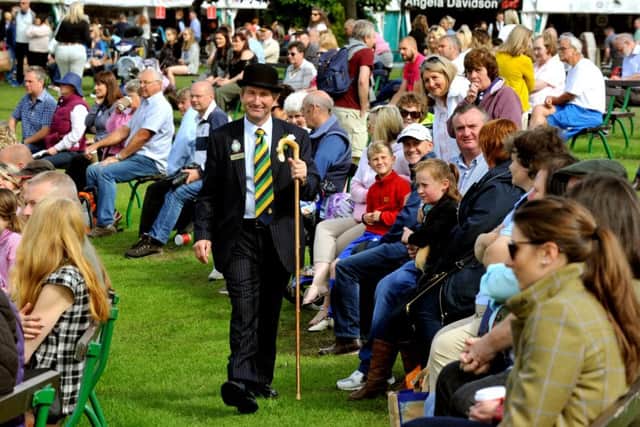 Charles Mills, show director for the Great Yorkshire Show walks through the crowds as his first show comes to the end.