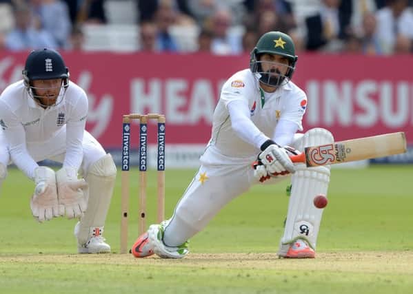 Pakistans Misbah-Ul-Haq plays a reverse sweep during day one of the Investec Test match at Lords. He finished the day unbeaten on 110 (Picture: Anthony Devlin/PA).
