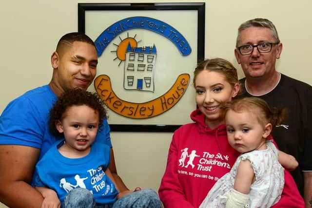 Anton Moses and Jessica Dagg with their children Elise and Cohen and granddad Pauk Dagg. The family used the trust when Elise received treatment at the LGI. She was able to go home on Friday. Picture Scott Merrylees