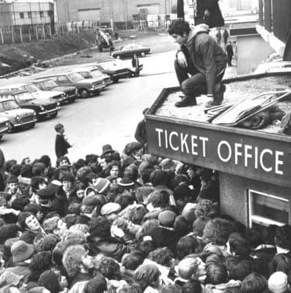 HISTORIC ARCHIVE FEATURE
Leeds, Elland Road, 7th April 1970

West Stand Ticket Office

Queuing for Cup Tickets?