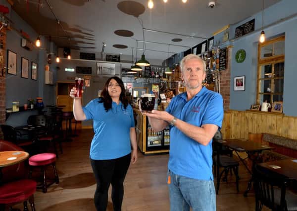 A new micropub has opened in the historic lifeboat station, Seaside Road, Withernsea. Pictured Natasha Midgley (Barstaff) with owner, retired policeman Rick Hall.