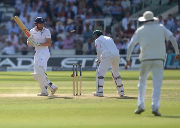 England and Yorkshires Jonny Bairstow looks back to see the bails flying after he was bowled by Pakistans Yasir Shah (Picture: Anthony Devlin/PA Wire).