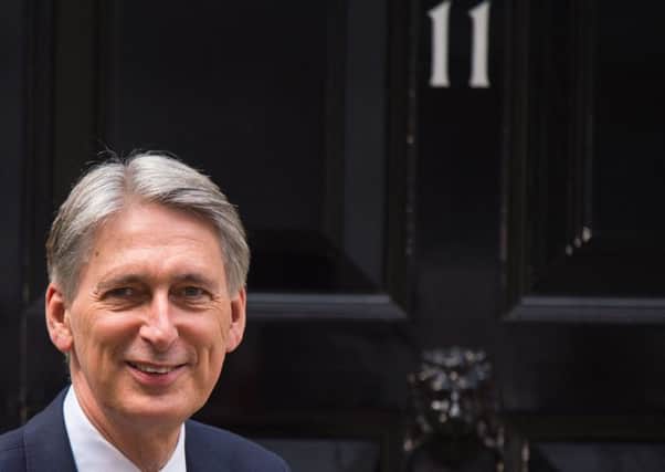 Chancellor Philip Hammond, seen here outside Downing Street. (Dominic Lipinski/PA Wire).