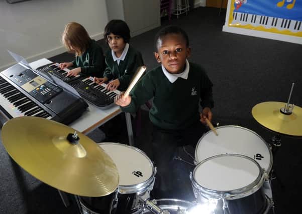 Pupils at Dixons Music Primary, Trinity Road, Bradford, in 2013 . Picture By Simon Hulme.