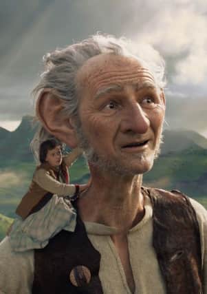 The BFG. Pictured: Ruby Barnhill as Sophie and Mark Rylance as The BFG.