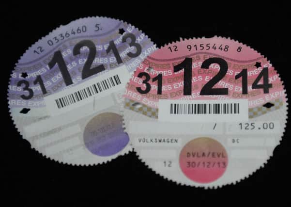 Revenue from vehicle excise duty fell by 93m in the year after the abolition of the paper tax disc