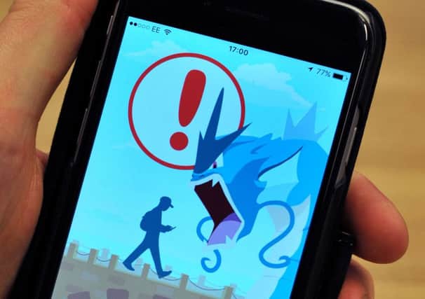A view of the Pokemon Go app launch screen on a phone. The app launched in the UK recently . (PA).