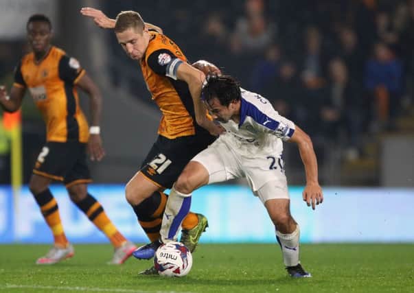 Hull City's Michael Dawson (left) is expected to be out injured for the next three months.