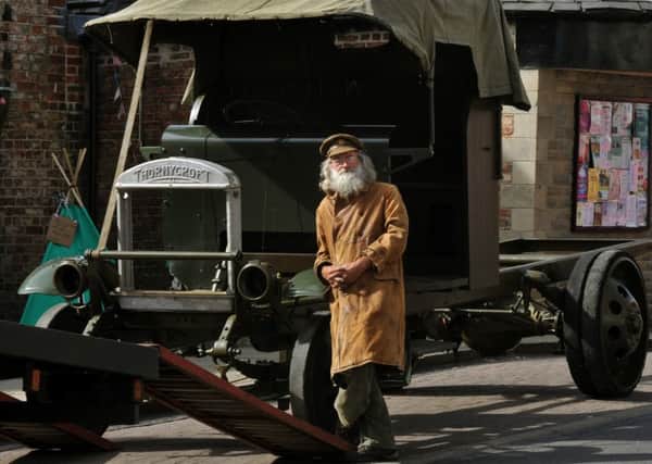 John Marshall  with his  Thornycroft lorry  he is restoring in Malton .
