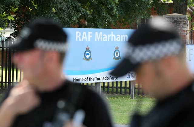 A serviceman was threatened with a knife near RAF Marham in Norfolk