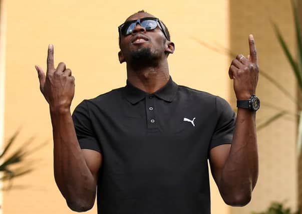 Usain Bolt poses ahead of his press conference at the Grange Tower Bridge Hotel, London. (Picture: Steven Paston/PA Wire)