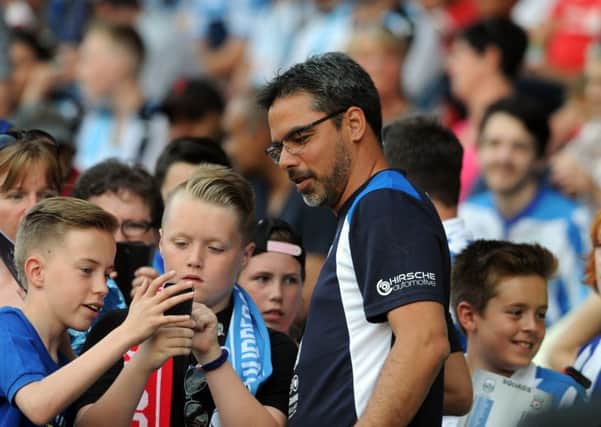 Huddersfield Town head coach David Wagner poses for a photograph with fans at Wednesday's game with Liverpool (Picture: Tony Johnson).