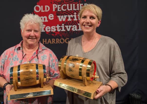 Handout photo of Clare Macintosh with Val McDermid (left) who was presented with Theakstons Old Peculier outstanding contribution to crime fiction award, after she was named winner of Best Crime Novel of the Year Award 2016 at the Theakston Old Peculier Crime Writing Festival in Harrogate with her debut thriller, I Let You Go.