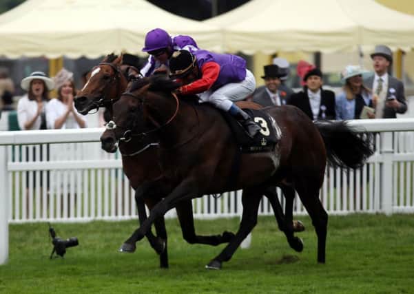 ON COURSE: Dartmouth, seen winning the Hardwicke Stakes at Royal Ascot with Olivier Peslier, returns to the track today. Picture: PA.