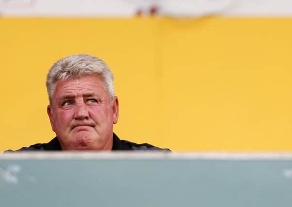 Hull City manager Steve Bruce, pictured during the pre-season friendly match at  Mansfield on Tuesday night, has quit the club after becoming disillusioned with the club's transfer policy (Picture: Barry Coombs/PA).
