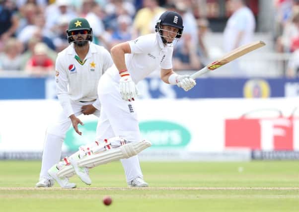 England's Joe Root hits out against Pakistan on his way to an unbeaten 141 at Old Trafford on day two of the second Test match. Picture: Martin Rickett/PA.