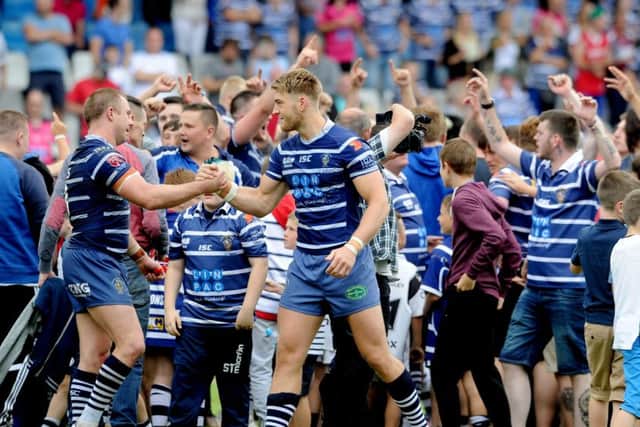 Featherstone Rovers players celebrates their win over Bradford Bulls. Picture: James Hardisty