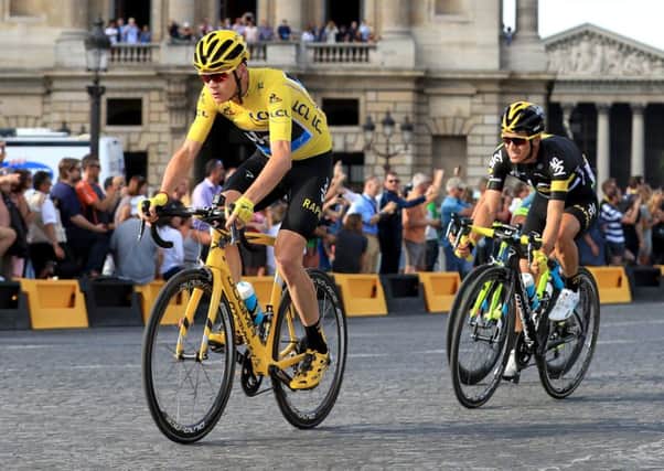 Britains Chris Froome, clad in the Tour de France  leaders yellow jersey, cycles serenely during the 113km final stage from Chantilly to the Champs-Elysees, in Paris (Picture: John Walton/PA Wire).