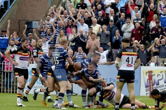 Featherstone Rovers' Anthony Thackeray, celebrating after scoring a try. Picture James Hardisty.