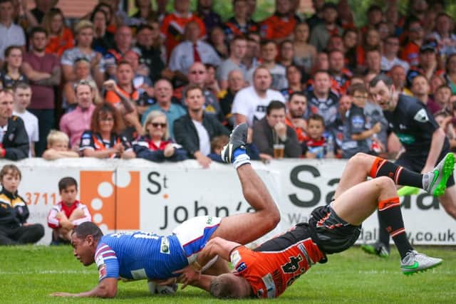 OVER THE LINE: Wakefield's Reece Lyne scores a try. Picture by Alex Whitehead/SWpix.com
