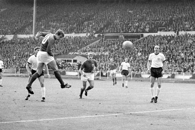 Geoff Hurst heads the equalising goal in the 1966 World Cup final.