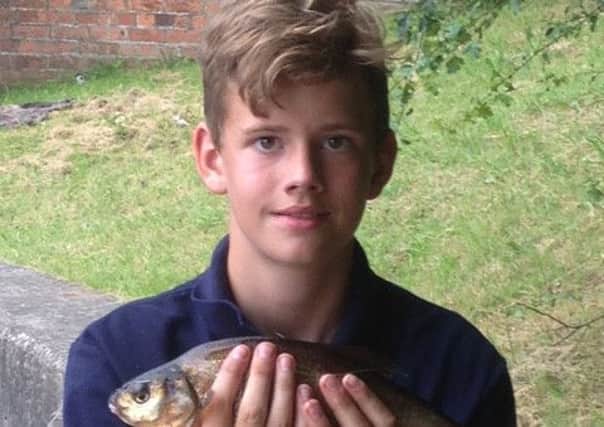 13-year-old Bradley Gannon was saved from drowning when he fell into Stainforth canal after passing out from the heat on a fishing trip.