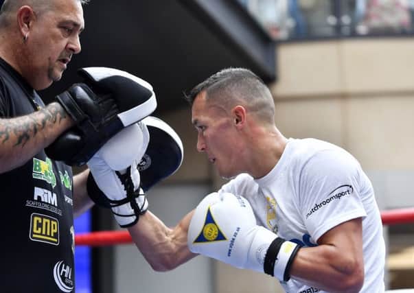 Josh Warrington performs in an open workout at Leeds Trinity ahead of Saturdays fight (Picture: Jonathan Gawthorpe).