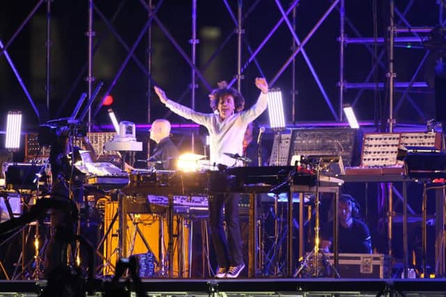 Jean Michel Jarre performs in Monte Carlo Harbour, Monaco, as part of celebrations following the civil ceremony of the wedding of Prince Albert II and Princess Charlene of Monaco. Picture: Dominic Lipinski/PA Wire