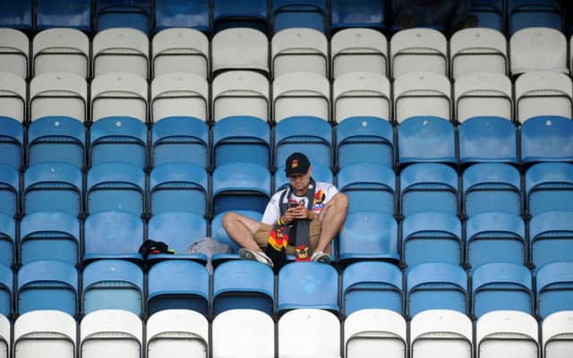 A dejected Bradford Bulls fan at the end of the Featherstone match at the weekend.