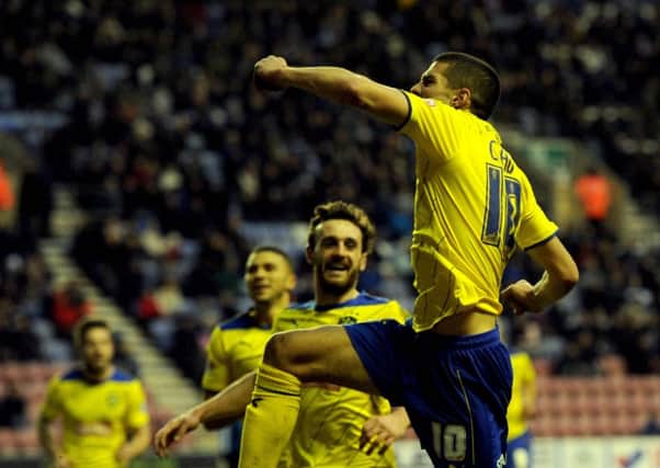 Ex-Huddersfield Town man Conor Coady, pictured celebrating a late goal for the Terriers, has been linked with a move to Sheffield Wednesday.