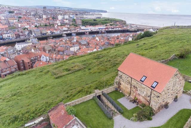 The conversion is in the grounds of Whitby Abbey on top of the East Cliff