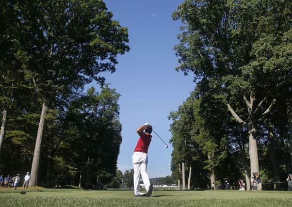 Hideki Matsuyama, of Japan, watches his tee shot on the fifth hole during a practice round for the PGA Championship golf tournament at Baltusrol Golf Club in Springfield. (AP Photo/Tony Gutierrez)