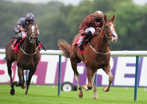 Top Notch Tonto ridden by Dale Swift (right) wins the betfred.com Superior Mile at Haydock Park