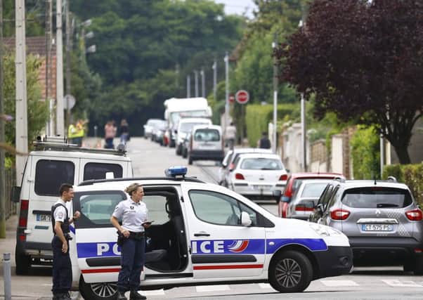 French police at the scene of Tuesday's attack.