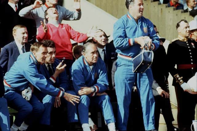 Team manager Alf Ramsay and trainer Harold Sheperdson (standing) watching from the bench during the final (PA).