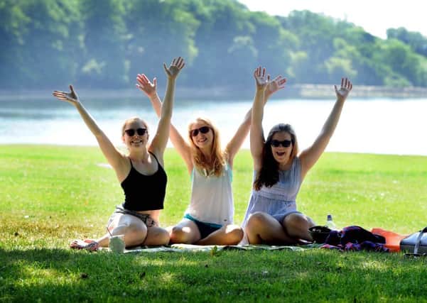 Niamh Hendron, Emily Stocks, and Abby Wheeler, all aged 17, enjoying the warm weather in Roundhay Park, Leeds, earlier this week.
Picture James Hardisty