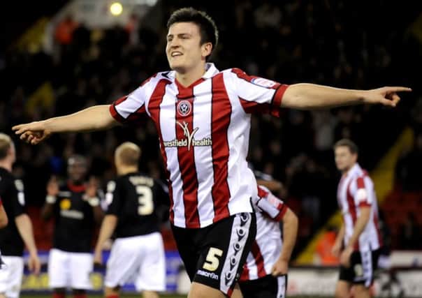 Hull City's Harry Maguire, pictured playing for Sheffield United, has been linked with a move to Middlesbrough.