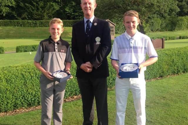 Yorkshire Under-14 champion Ben Schmidt and Under-16 Champion Michael Hay with Yorkshire Union of Golf Clubs' president Jonathan Plaxton.
