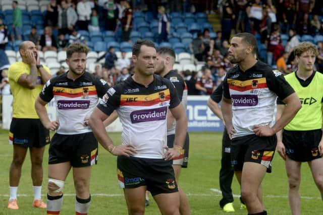 Dejected Bradford Bull players after losing their crunch game against Featherstone Rovers on Sunday.